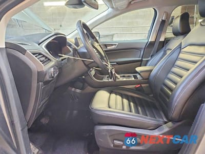 Zdjęcie 7 z 13 samochodu: 2021 FORD EDGE SEL VIN:2FMPK4J90MBA09682 - miniatura