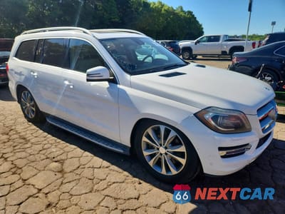 Czwarte zdjęcie samochodu z boku: 2014 MERCEDES-BENZ GL 450 4MATIC VIN:4JGDF7CE9EA287965 - miniatura