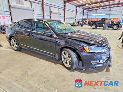 Czwarte zdjęcie samochodu z boku: 2015 VOLKSWAGEN PASSAT SE VIN:1VWBS7A31FC018564 - miniatura