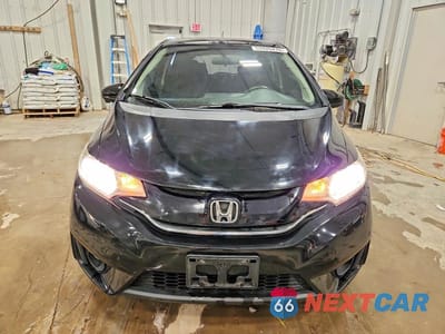 Piąte zdjęcie samochodu w środku: 2016 HONDA FIT EX VIN:JHMGK5H71GX046010 - miniatura