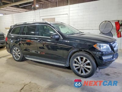 Czwarte zdjęcie samochodu z boku: 2014 MERCEDES-BENZ GL 450 4MATIC VIN:4JGDF7CE2EA401255 - miniatura