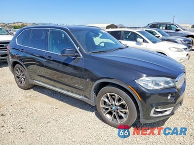 Czwarte zdjęcie samochodu z boku: 2018 BMW X5 XDR40E VIN:5UXKT0C59J0W03035 - miniatura