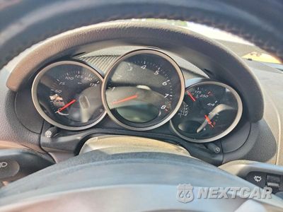 Zdjęcie 9 z 13 samochodu: 2009 PORSCHE BOXSTER VIN:WP0CA29889S710067 - miniatura
