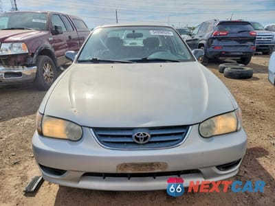 Piąte zdjęcie samochodu w środku: 2001 TOYOTA COROLLA CE VIN:1NXBR12E31Z500978 - miniatura