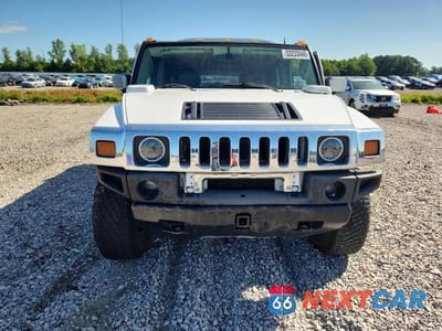 Piąte zdjęcie samochodu w środku: 2004 HUMMER H2 VIN:5GRGN23U44H122571 - miniatura