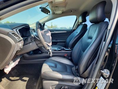 Zdjęcie 7 z 13 samochodu: 2016 FORD FUSION TITANIUM PHEV VIN:3FA6P0SU1GR229566 - miniatura