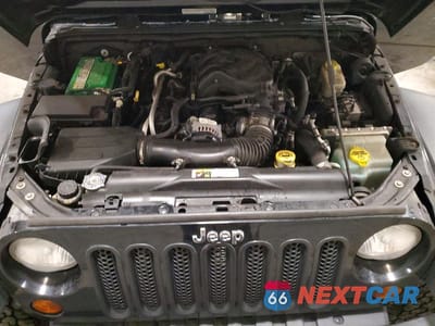 Zdjęcie 12 z 13 samochodu: 2013 JEEP WRANGLER UNLIMITED SPORT VIN:1C4BJWDG7DL637178 - miniatura