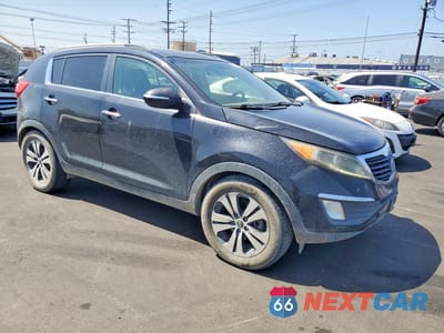 Czwarte zdjęcie samochodu z boku: 2012 KIA SPORTAGE EX VIN:KNDPC3A27C7224319 - miniatura