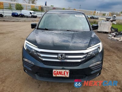 Piąte zdjęcie samochodu w środku: 2016 HONDA PILOT EX VIN:5FNYF6H48GB023677 - miniatura
