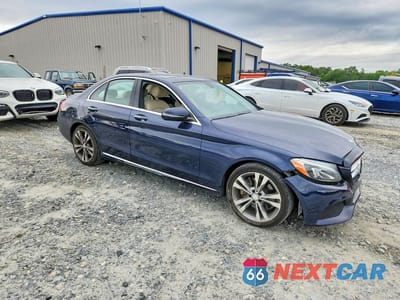 Czwarte zdjęcie samochodu z boku: 2016 MERCEDES-BENZ C 300 VIN:55SWF4JB6GU164069 - miniatura