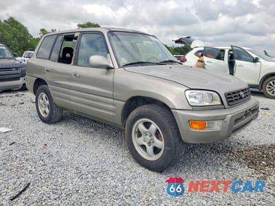 Czwarte zdjęcie samochodu z boku: 2000 TOYOTA RAV4 BASE VIN:JT3GP10V7Y7067004 - miniatura