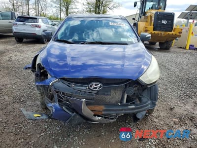 Piąte zdjęcie samochodu w środku: 2012 HYUNDAI TUCSON LIMITED VIN:KM8JUCAC2CU435517 - miniatura
