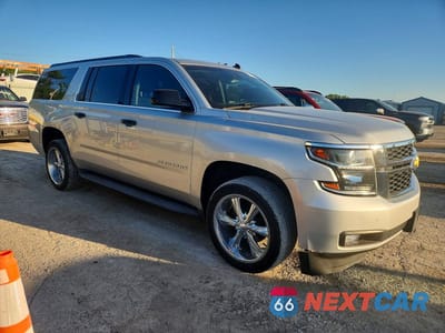 Czwarte zdjęcie samochodu z boku: 2015 CHEVROLET SUBURBAN K1500 LT VIN:1GNSKJKC8FR175057 - miniatura