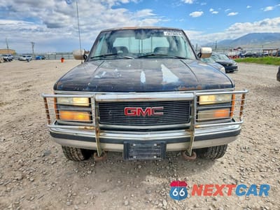 Piąte zdjęcie samochodu w środku: 1992 GMC SIERRA K2500 VIN:2GTGK29KXN1505435 - miniatura