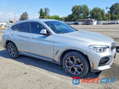 Czwarte zdjęcie samochodu z boku: 2021 BMW X4 XDRIVE30I VIN:5UX2V1C08M9H49000 - miniatura