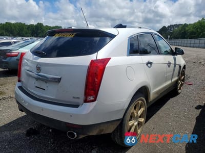 Trzecie zdjęcie samochodu z tyłu: 2015 CADILLAC SRX PERFORMANCE COLLECTION VIN:3GYFNCE39FS586659 - miniatura