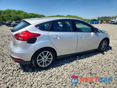 Trzecie zdjęcie samochodu z tyłu: 2016 FORD FOCUS SE VIN:1FADP3K23GL282954 - miniatura
