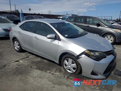 Czwarte zdjęcie samochodu z boku: 2017 TOYOTA COROLLA L VIN:5YFBURHE0HP691467 - miniatura