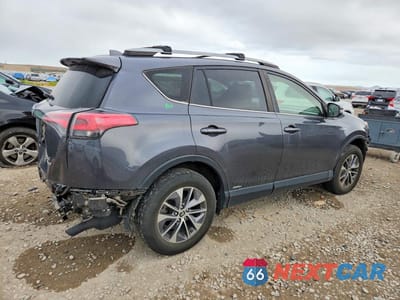 Trzecie zdjęcie samochodu z tyłu: 2017 TOYOTA RAV4 HYBRID XLE VIN:JTMRJREV2HD109156 - miniatura