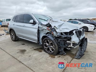 Czwarte zdjęcie samochodu z boku: 2021 BMW X3 SDRIVE30I VIN:5UXTY3C06M9G76989 - miniatura