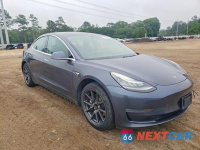 Czwarte zdjęcie samochodu z boku: 2019 TESLA MODEL 3 VIN:5YJ3E1EA5KF317119 - miniatura