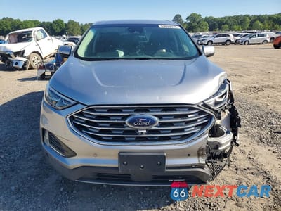 Piąte zdjęcie samochodu w środku: 2022 FORD EDGE TITANIUM VIN:2FMPK4K94NBA39977 - miniatura