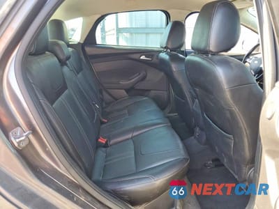 Zdjęcie 10 z 13 samochodu: 2014 FORD FOCUS TITANIUM VIN:1FADP3N21EL311957 - miniatura