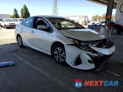 Czwarte zdjęcie samochodu z boku: 2017 TOYOTA PRIUS PRIME PREMIUM VIN:JTDKARFP4H3042924 - miniatura