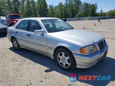 Czwarte zdjęcie samochodu z boku: 2000 MERCEDES-BENZ C 230 VIN:WDBHA24G6YA829727 - miniatura
