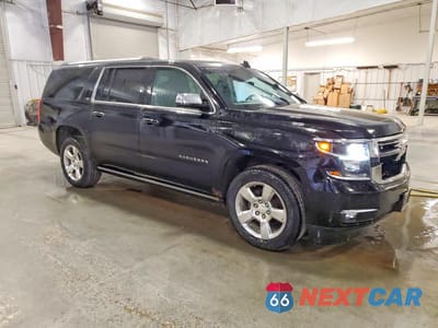 Czwarte zdjęcie samochodu z boku: 2016 CHEVROLET SUBURBAN K1500 LTZ VIN:1GNSKJKC8GR130427 - miniatura
