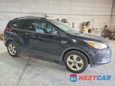 Czwarte zdjęcie samochodu z boku: 2016 FORD ESCAPE SE VIN:1FMCU9G94GUA73476 - miniatura
