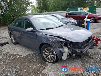 Czwarte zdjęcie samochodu z boku: 2012 VOLKSWAGEN PASSAT S VIN:1VWAP7A31CC019982 - miniatura