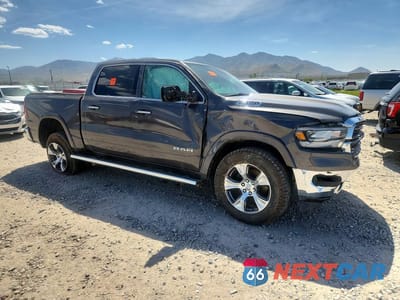 Czwarte zdjęcie samochodu z boku: 2022 RAM 1500 LARAMIE VIN:1C6SRFJT9NN282120 - miniatura