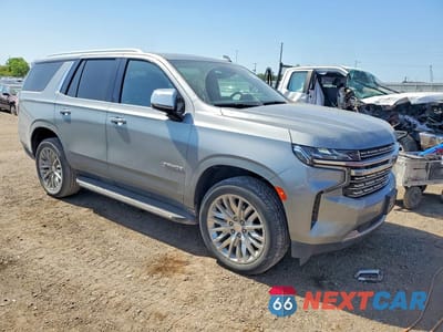Czwarte zdjęcie samochodu z boku: 2024 CHEVROLET TAHOE K1500 PREMIER VIN:1GNSKSKD7RR109392 - miniatura