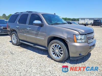 Czwarte zdjęcie samochodu z boku: 2013 CHEVROLET TAHOE C1500 LTZ VIN:1GNSCCE03DR241473 - miniatura