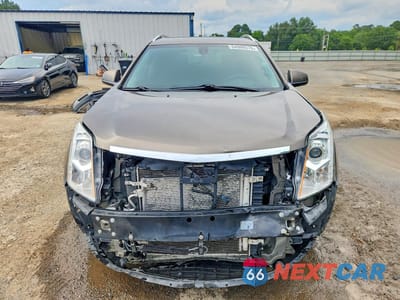 Piąte zdjęcie samochodu w środku: 2015 CADILLAC SRX LUXURY COLLECTION VIN:3GYFNBE38FS620018 - miniatura