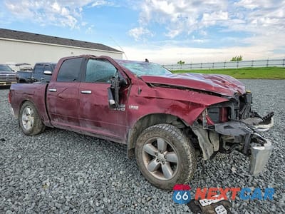 Czwarte zdjęcie samochodu z boku: 2017 RAM 1500 SLT VIN:3C6RR7LTXHG641201 - miniatura