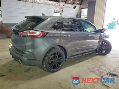 Trzecie zdjęcie samochodu z tyłu: 2022 FORD EDGE ST VIN:2FMPK4AP1NBA63962 - miniatura