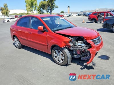 Czwarte zdjęcie samochodu z boku: 2011 KIA RIO LX VIN:KNADH4A38B6850272 - miniatura