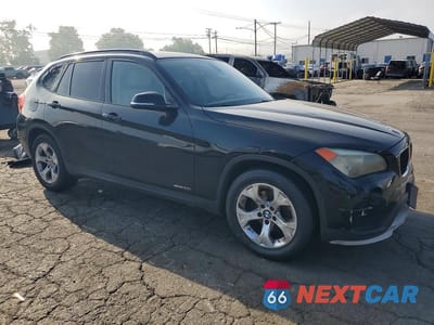 Czwarte zdjęcie samochodu z boku: 2015 BMW X1 SDRIVE28I VIN:WBAVM1C51FV316023 - miniatura