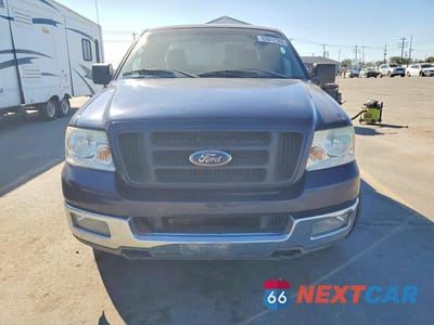 Piąte zdjęcie samochodu w środku: 2004 FORD F150 VIN:1FTPX14564NB40942 - miniatura