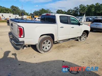 Trzecie zdjęcie samochodu z tyłu: 2016 GMC CANYON SLT VIN:1GTG5DE3XG1174351 - miniatura