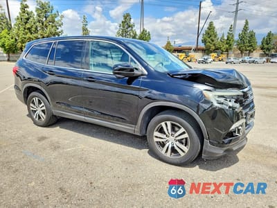 Czwarte zdjęcie samochodu z boku: 2017 HONDA PILOT EXL VIN:5FNYF5H53HB010159 - miniatura