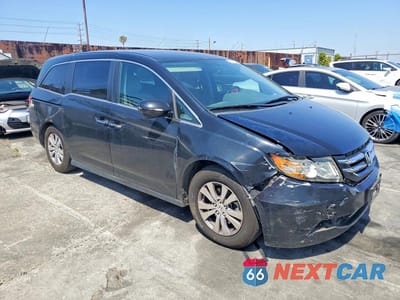 Czwarte zdjęcie samochodu z boku: 2016 HONDA ODYSSEY SE VIN:5FNRL5H39GB015800 - miniatura