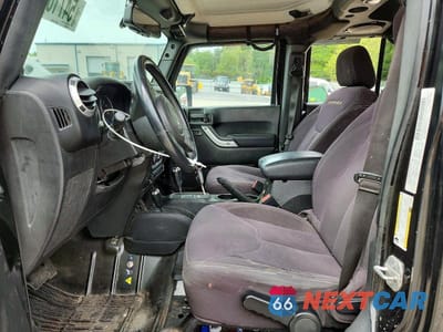 Zdjęcie 7 z 13 samochodu: 2013 JEEP WRANGLER UNLIMITED SAHARA VIN:1C4HJWEGXDL678493 - miniatura