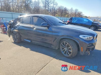 Czwarte zdjęcie samochodu z boku: 2021 BMW X4 XDRIVE30I VIN:5UX2V1C01M9F91101 - miniatura