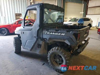 Trzecie zdjęcie samochodu z tyłu: 2022 POLARIS RANGER XP 1000 UTILITY VEHICLE VIN:4XARRY990N8076167 - miniatura
