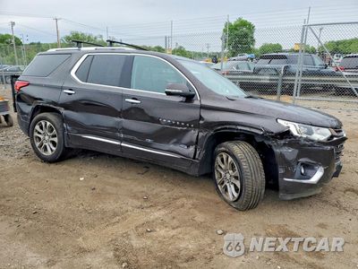 Czwarte zdjęcie samochodu z boku: 2018 CHEVROLET TRAVERSE PREMIER VIN:1GNERKKW0JJ117122 - miniatura