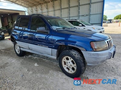 Czwarte zdjęcie samochodu z boku: 2000 JEEP GRAND CHEROKEE LAREDO VIN:1J4GW48S1YC357329 - miniatura