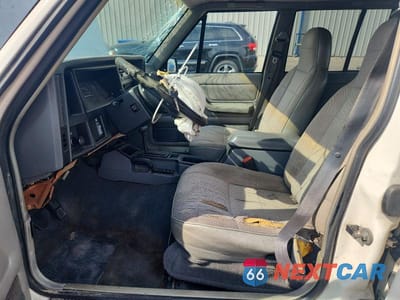 Zdjęcie 7 z 13 samochodu: 1996 JEEP CHEROKEE SPORT VIN:1J4FJ68S6TL316399 - miniatura